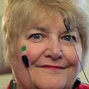 Close up of a woman's face with electrodes on it